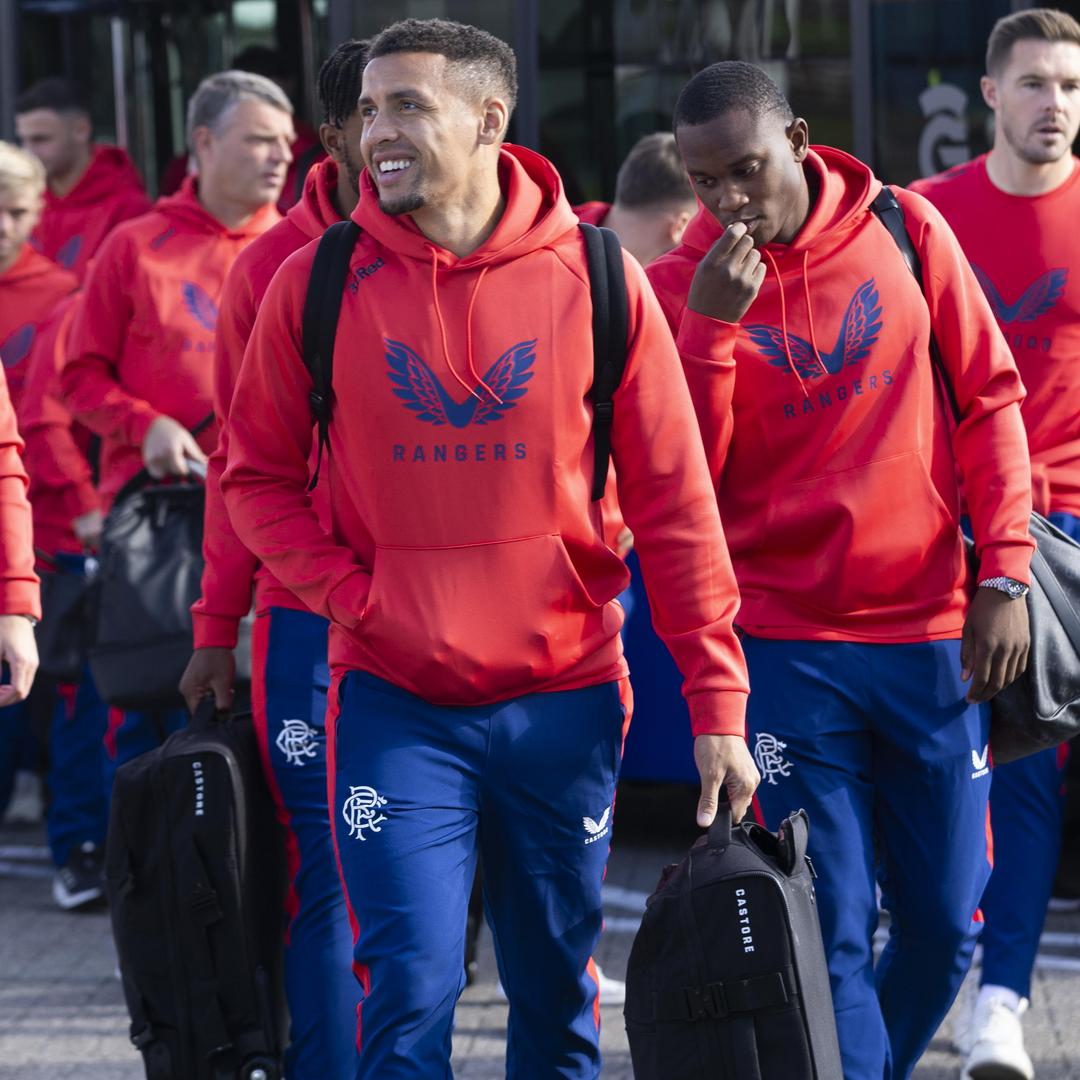 The Rangers FC team boarding a flight